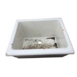 A butlers sink, the angled front side with cushion moulded rim. (24in x 20.75in x 15in)