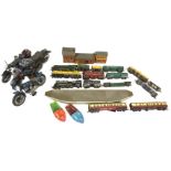 A quantity of Dublo pieces including three engines, trucks, a station platform, Triang, a signal