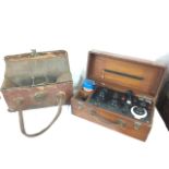A leather cased toolbox with brass lock and loop handles - W & TA Ltd; and a mahogany boxed