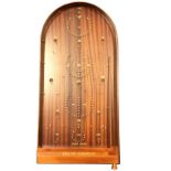A mint & boxed Jaques bagatelle board, the arched mahogany panel set with brass pins and steel