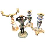 A pair of old quimper handpainted candlesticks; a nineteenth century Venetian glass candlestick in