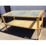 A rectangular gold plated metal haberdashery counter from a Scottish mill shop, the plate glass