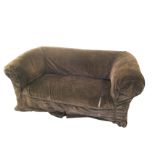 A Victorian upholstered chesterfield sofa with corduroy loose cover, the round padded back and