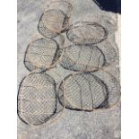 Six oval galvanised mesh potato trays. (23in) (6)