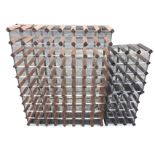 A rectangular wine rack to store 80 bottles; and two smaller tabletop wine racks each holding 12