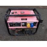 A large Duotool petrol generator with 13HP engine on tubular stand, complete with leaflet spec,