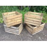 A set of four rectangluar slatted fruit crates. (16in x 20in x 12in) (4)