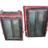 A set of eight restored cast iron Edwardian roof lights, each with twin moulded rectangular frames