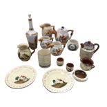 Nine pieces of Devon mottoware; a Staffordshire relief moulded four-piece hunting teaset and a