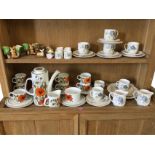 A 70s Meakin part coffee set decorated with poppies; a Sylvac mat glazed floral six-piece teaset