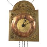 A French alarm wallclock with arts & crafts style copper chapter ring on arched brass face with