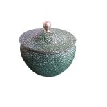 An oval bulbous silver plated shagreen stye mounted tea caddy, the domed cover with ball handle