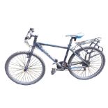 A Raleigh mountain bike with gel seat, airlift hydro formed tubing 17” frame, rear luggage rack,