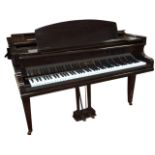A walnut cased Challen baby grand piano, the instrument with seven octave keyboard raised on