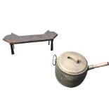 A Kendrick 1.5 gallon cast iron open fire cooking pot and cover, the angled handle to take wood