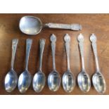 A set of four Victorian hallmarked silver spoons with foliate engraved handles - London; a set of