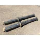 A pair of heavy octagonal cast iron posts with pointed cappings. (55in) (2)
