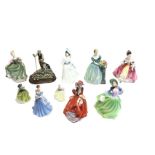 A collection of nine Royal Doulton lady figurines - Buttercup, Southern Belle, Michele, Top o’er the
