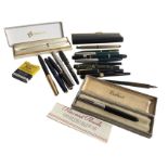 A collection of fountain pens including a boxed Sheaffer Australia, Parkers, Watermans, Duofolds,