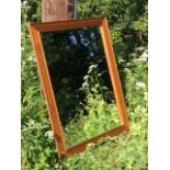 A large rectangular mirror with bevelled plate in channelled frame. (36.5in x 46in)