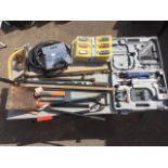 Miscellaneous tools including a Dron-Wal brass sprayer, a yard stick, a shovel, bolt cutters,