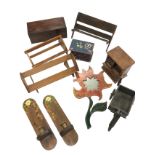 Miscellaneous treen - two miniature chests of drawers, a three-wheel cart, three book troughs, a