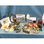 Miscellaneous items including a set of scales with weights, a brass cribbage board, a model plane, a