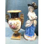 A nineteenth century Derby classical vase with winged caryatid gilt handles, painted with polychrome