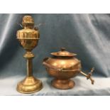 A nineteenth century copper urn & cover with swing handle raised on rolled foot, mounted with a