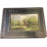 A French postcard album with signed impasto to cover, containing 46 cards - mainly First World War