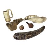 A shark jaw with rows of teeth; three carved gourd type vessels; and a carved & bent horn