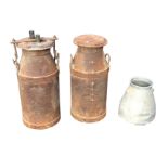 Two old 29in CWS tubular milk churns & covers, one plumbed for boiler conversion; and a bell