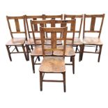 A set of eight elm seated church type chairs with rectangular splats in bar backs, raised on
