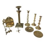 Miscellaneous brass including a pair of heavy brass candlesticks, a foliate scrolled easel stand,