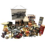 Miscellaneous collectors items including old tins, clocks, a set of six plaster Bossons, flat irons,