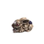 A silver pin cushion modelled as a seated rabbit with pink glass eyes and soft mound to back - 925