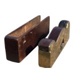 A Victorian mahogany cased brass plane by Sorby of Sheffield, the shaped tool with steel blade in