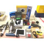 Miscellaneous electrical car gear including a battery charger, a polisher, a shell brace, cordless