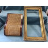 A mahogany framed shaped cane lumbar support for a chair/car; and a rectangular Victorian gilt &