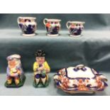 Miscellaneous ceramics - a set of three nineteenth century graduated gaudy welsh jugs, two toby