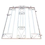 A wrought iron garden gate with scrolled decoration and square bars to rectangular frame, complete