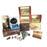 Miscellaneous items including placemats, a leather suitcase, an Italian musical cigarette box, a