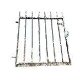 A heavy iron gate with spindles in rectangular frame, complete with latch. (29.75in x 36in)