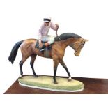 Geenty, a moulded model of a racehorse with jockey up - impressed monogram & date. (12.5in x 10in)