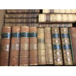 Leather bound books: Waverley Novels published in 1877 in four volumes; Constitutional History of