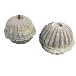 A pair of nineteenth century carved sandstone fluted ball finials, each with central collars with