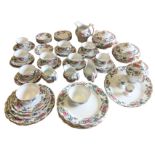 A Booths floral dinner & teaset decorated in the Floradora pattern with dinner plates, tureens &
