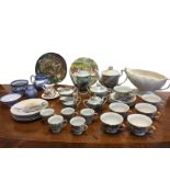 A Japanese part tea & coffee set decorated with landscapes having lithophane bases; and