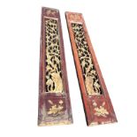 A pair of rectangular carved gilded panels with square leaf ends framing pierced blossom foliage
