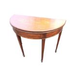 A nineteenth century D-shaped mahogany turn-over-top table with moulded twin leaves above a